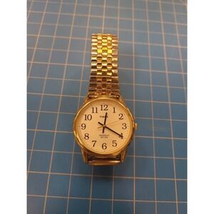 Timex Indiglo Watch Gold Tone Stainless Steel Band Mens Womens Analog Timepiece